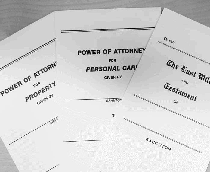 a picture of a full set of will documents comprising the Last will and Testament, a Power of Attorney for Personal Care and a Power of Attorney for Property